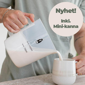 Man pouring fresh plant-based milk from a Mylky mini jug into a cup